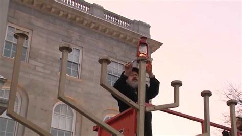 Menorah lighting ceremony held at State House to mark first night of ...