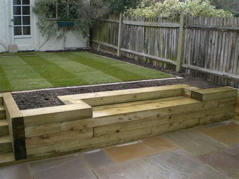 Sleep edging with bench | Sleepers in garden, Garden seating, Backyard