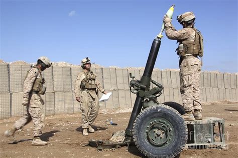 Marines Prepare To Fire A 120mm Mortar Photograph by Stocktrek Images