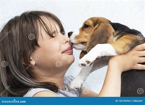 Teen Girl with Dog, Dog Licks Her Face Stock Photo - Image of hipster, cute: 155149354