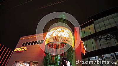 Driving on Las Vegas Strip at Night. Glowing Coca Cola Logo and Bottle ...