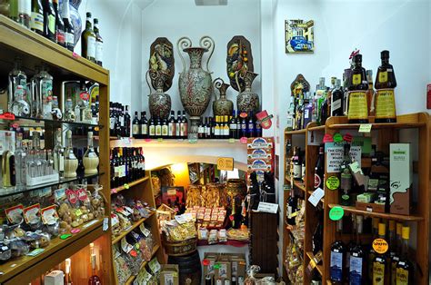 Assisi Wine Shop Photograph by Reese Lewis - Fine Art America