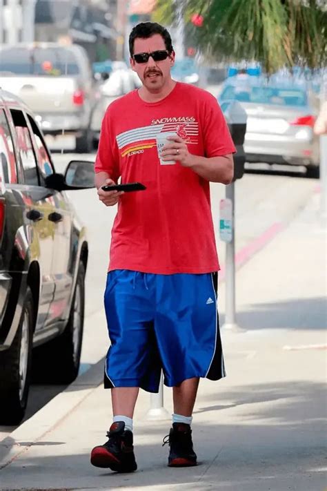 Adam Sandler always looks comfortable in basketball shorts and baggy ...