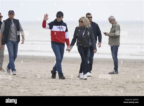 French President Emmanuel Macron and wife Brigitte Macron walking on ...