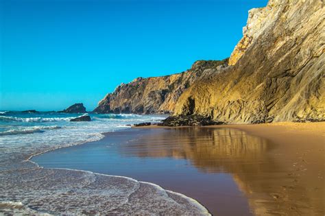 Caves at Adraga Beach - Praia da Adraga Close to Sintra