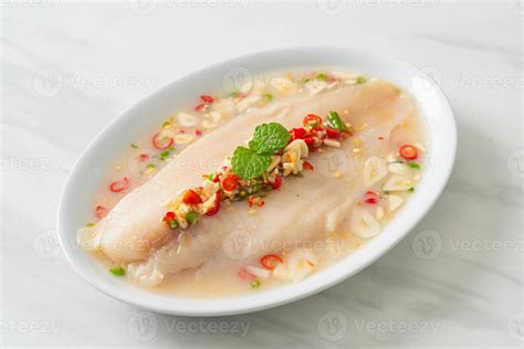 Steamed Fish in Spicy Lemon Sauce 14631412 Stock Photo at Vecteezy