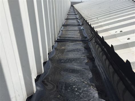 Absolute Roofing Solutions - Gutter Lining