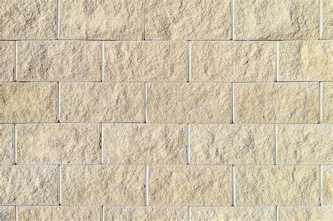 Old beige stone wall background texture Stock Photo by ©llawenydd@mail.ru 111979342