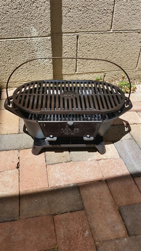 Lodge Cast Iron Charcoal Hibachi-style grill for Sale in Scottsdale, AZ ...