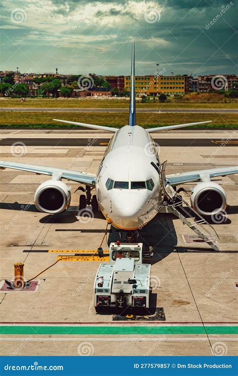 TUG Pushback Tractor With Aircraft Royalty-Free Stock Image ...