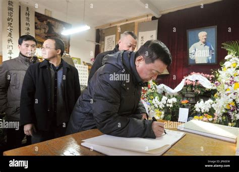 BEIJING, China - A man registers his name at the home of Zhao Ziyang ...