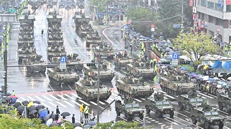 South Korea flexes military muscle with parade, issues dire warning ...