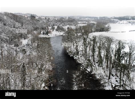 Snowfall on woodland with view from pontcysyllte aqueduct Llangollen in winter Stock Photo - Alamy