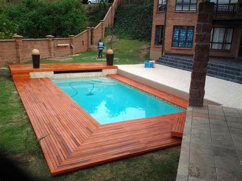 15 Stunning Above Pool Wooden Deck Design Ideas | Wooden pool, Wood pool deck, Wooden deck designs