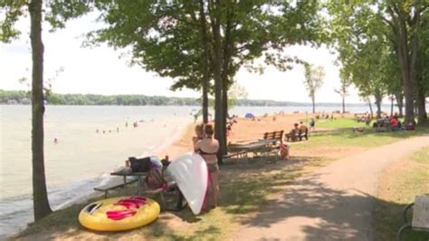 Beating the heat, beach-goers celebrate summer with last hoorah at Lake ...