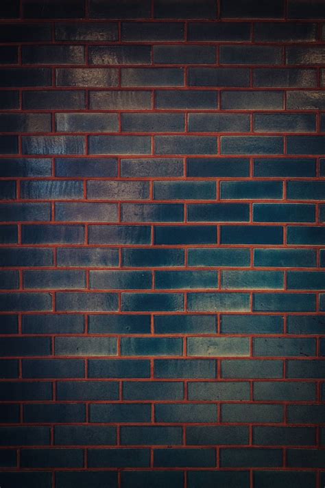 Download Black Brick Wall With Red Wallpaper | Wallpapers.com