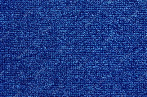 Premium Photo | Close up of dark blue color carpet texture background with seamless pattern.