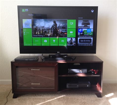 Xbox One and Xbox 360 Gaming Setup with Flat Screen TV