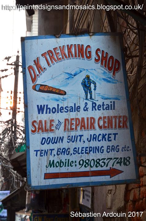 Painted signs and mosaics: D. K. Trekking Shop, Kathmandu