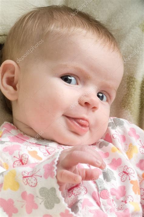 Happy Baby Sticking Tongue Out — Stock Photo © vesivus #6812433