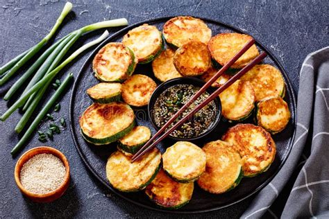 Hobak Jeon, Pan Fried Zucchini with Dipping Sauce Stock Image - Image ...