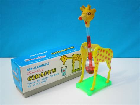 drinking giraffe