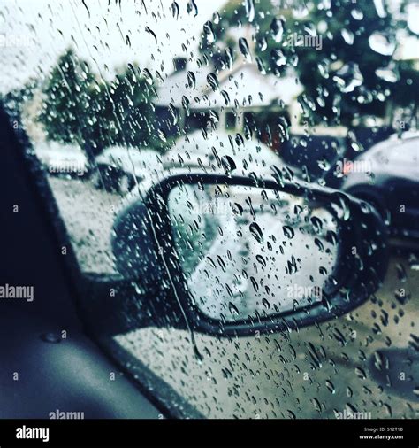 Rain on a car window Stock Photo - Alamy