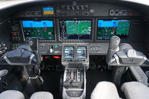 Cockpit and instrument panel of a Cessna Citation M2. Garmin 3000 avionics. #jet #airplane ...