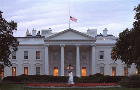 American Flag Flies At Half-Staff Over The White House At Sunrise ...