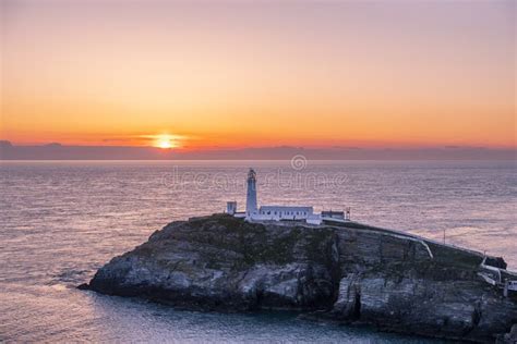 Sunset at South Stack Lighthouse on Anglesey in Wales Stock Image ...