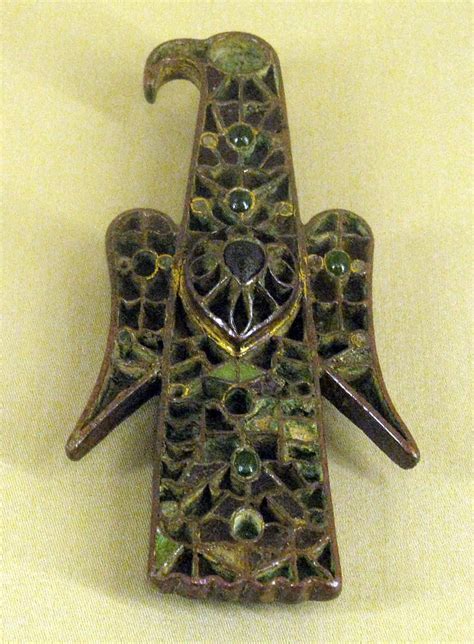 A bronze eagle-shaped fibula with colored glass-paste inla… | Flickr