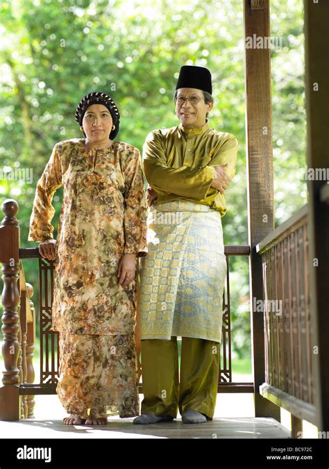 senior couple with traditional costume standing together Stock Photo - Alamy