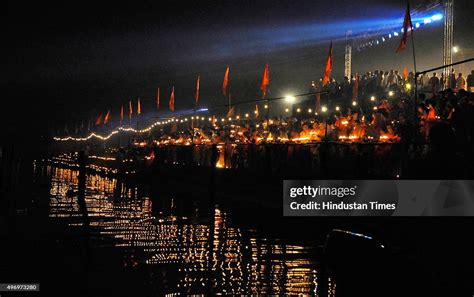 Devotees offering first-ever Yamuna Aarti at Kudesia Ghat, on the ...