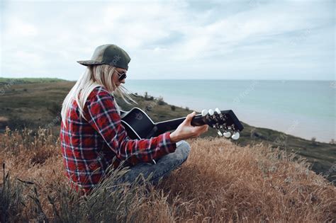 Premium Photo | Girl with a guitar