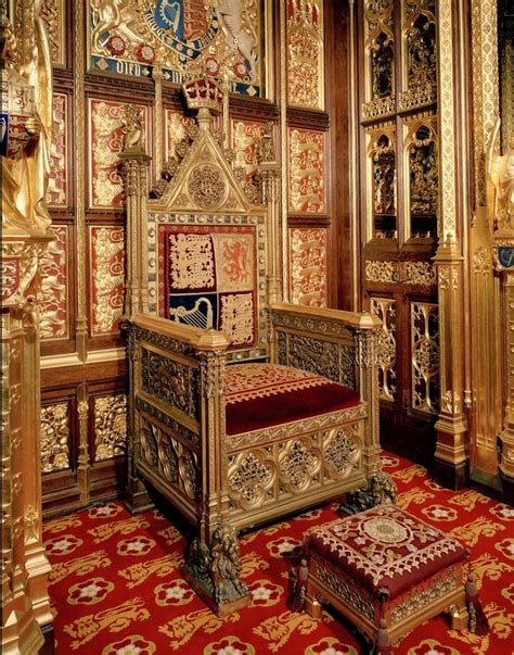 an ornately decorated room with red carpet and gold furniture ...