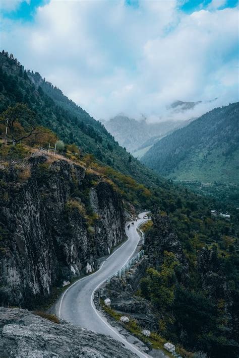 Aerial View of a Road in Mountains · Free Stock Photo