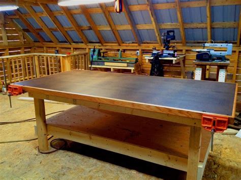 John builds himself a much needed shop table for his upstairs woodshop. Description from article ...