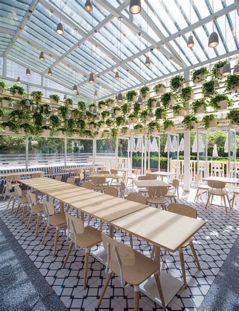 Four O Nine transforms greenhouse into plant-lined cafe | Greenhouse ...