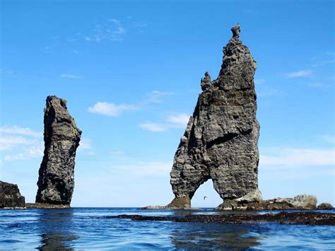 Kellingin is a 223-foot tall sea stack containing an arch just off the ...