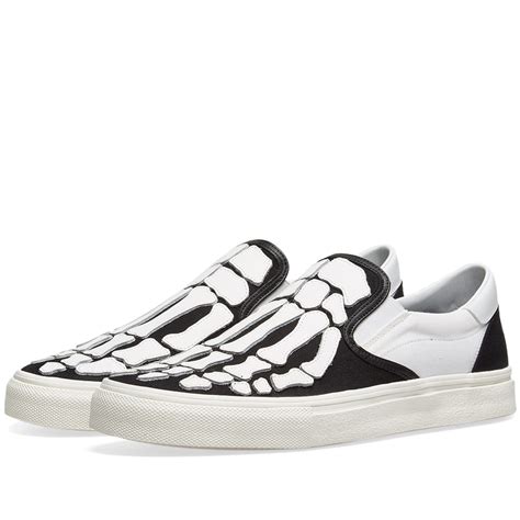 AMIRI Slip On Bones Sneaker Black & White | END. (KR)