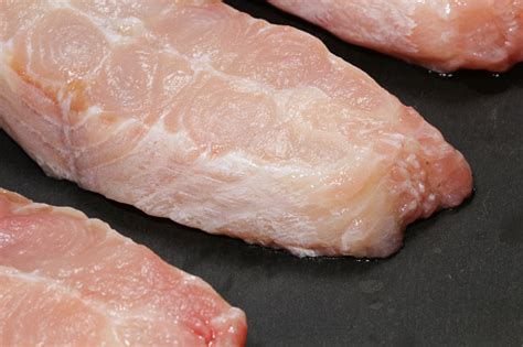 Raw Catfish Steaks On A Grey Stone Background Selective Focus Stock Photo - Download Image Now ...