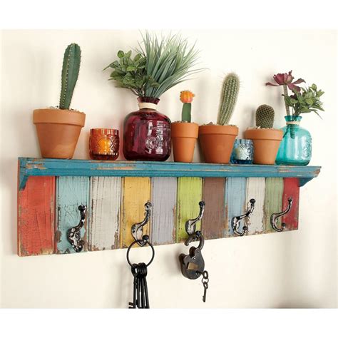 Dimensions: 35W x 5D x 9H in.. Iron, metal, and wood material. Multi colored finish. Cottage ...