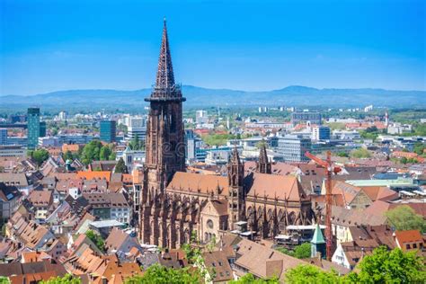 Cathedral in Freiburg stock photo. Image of clouds, important - 115202292