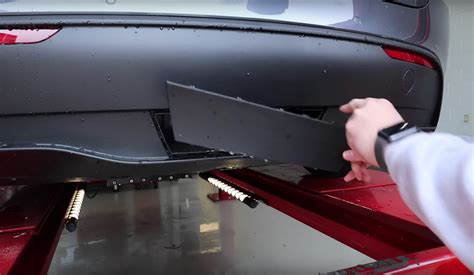 Tesla Model Y trailer hitch cover plate reveals room for towing down the road – Maxxd.com