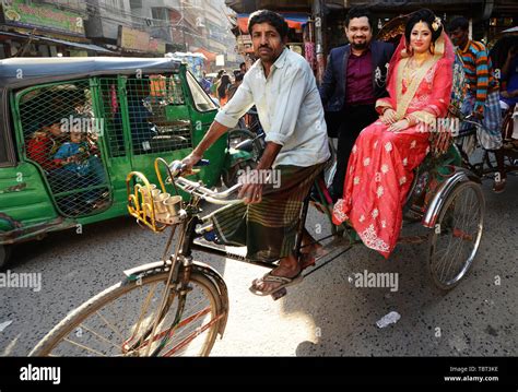 A Bangladeshi newlyweds on a cycle rickshaw in Old Dhaka Stock Photo - Alamy