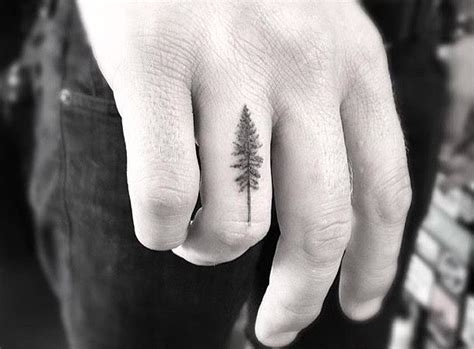 Finger Tattoos - Tattoo Insider | Finger tattoo designs, Tree tattoo small, Small finger tattoos