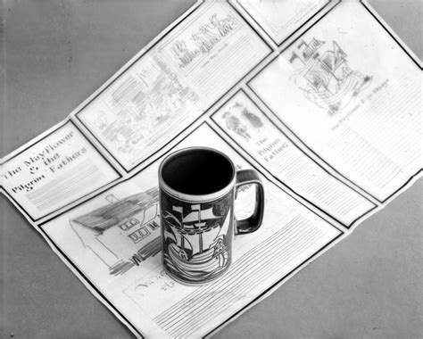 A coffee mug sitting on top of a newspaper photo – Free Cup Image on ...
