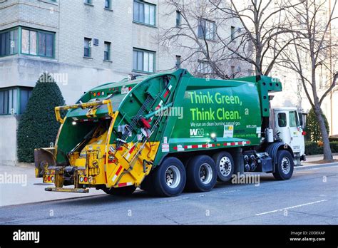 WASHINGTON, DC -21 FEB 2020- View of a Waste Management garbage truck saying Think Green, Think ...