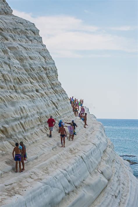 PORTO EMPEDOCLE, ITALY - AUGUST, 2015: Some Tourists in the Beach Scala Dei Turchi, One of the ...