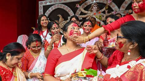 Durga Puja 2023: Women participate in Sindoor Khela on Vijayadashami. See pics from across the ...